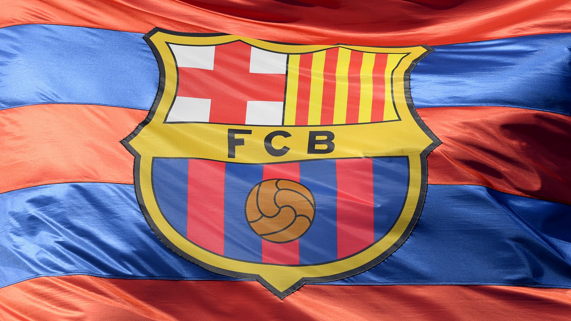 FC Barcelona's logo, on a flag / Creator: Mike Hewitt | Credit: Getty Images