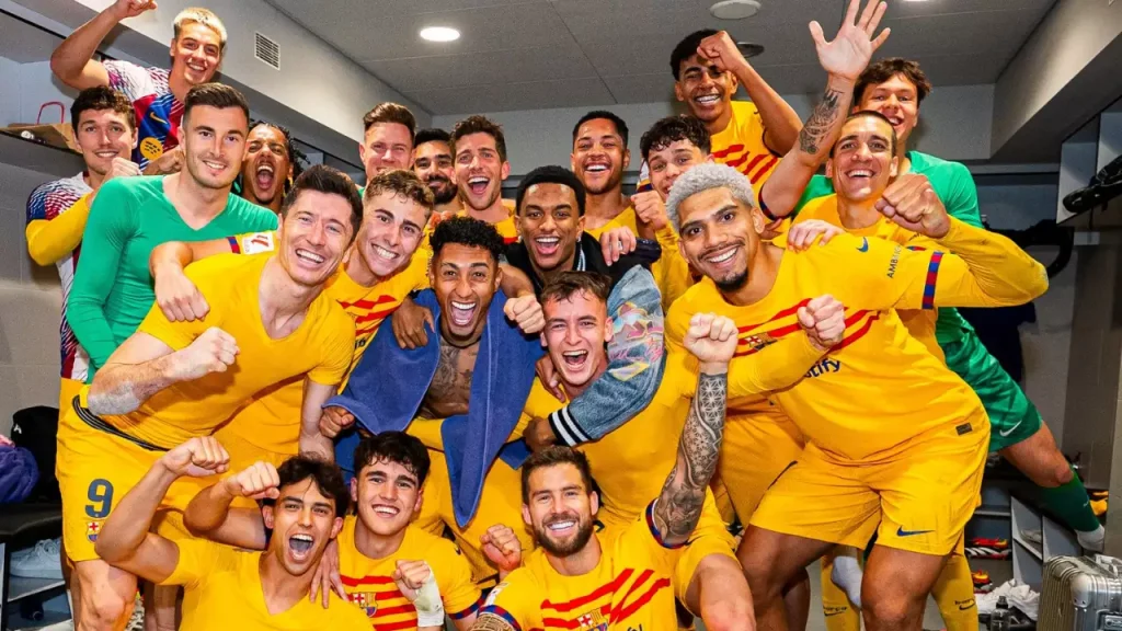 Team celebrating their win against Atletico Madrid yesterday / Getty Images