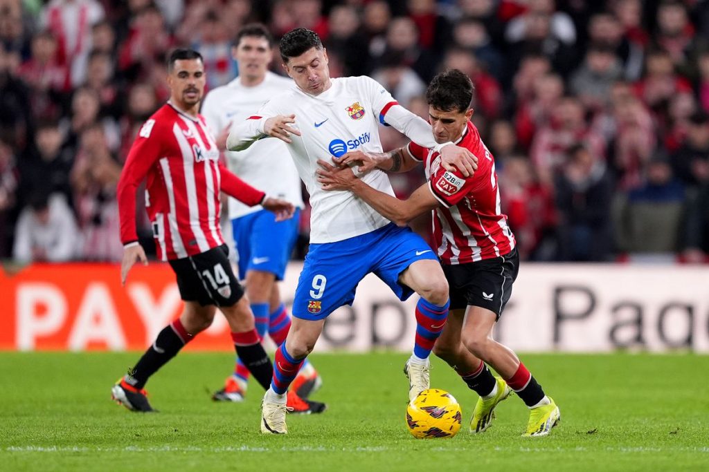 Robert Lewandowski in action agains tAthletic Club / Getty Images